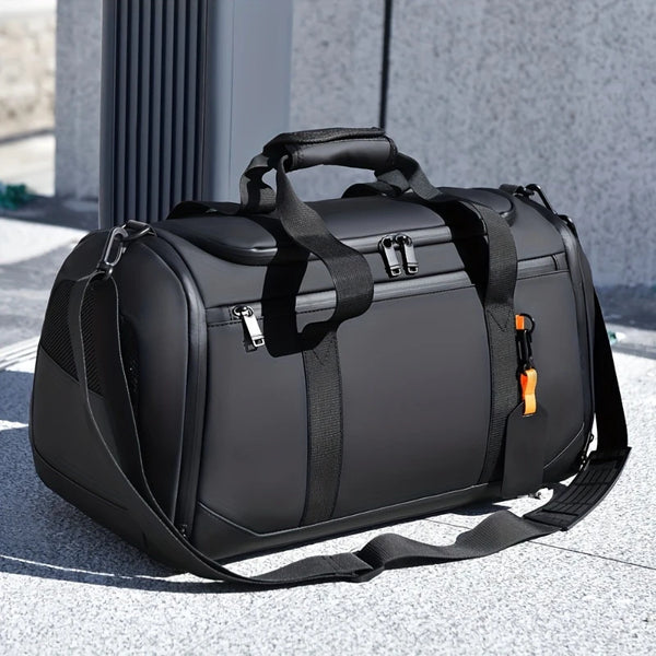 A black large carry-on duffel bag resting on a light gray outdoor surface.