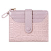 A light pink PU leather card wallet with a quilted texture and a flap closure.