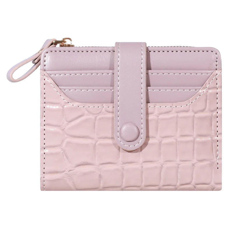 A light pink PU leather card wallet with a quilted texture and a flap closure.
