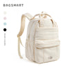 A beige women's lightweight backpack with light tan straps and a padded laptop compartment.