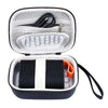 Open view of a black and white durable EVA hard shell camera case with padded interior