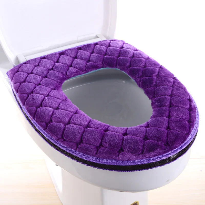 A purple plush waterproof toilet seat cover is shown installed on a white toilet bowl.