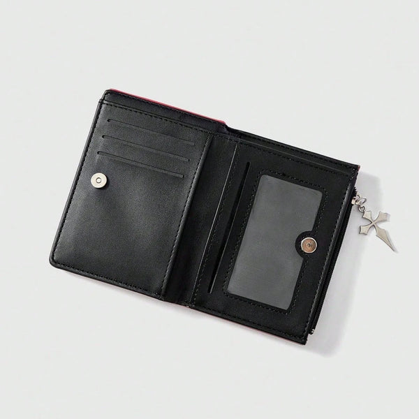 Black leather wallet with a red accent and a zipper coin pocket.