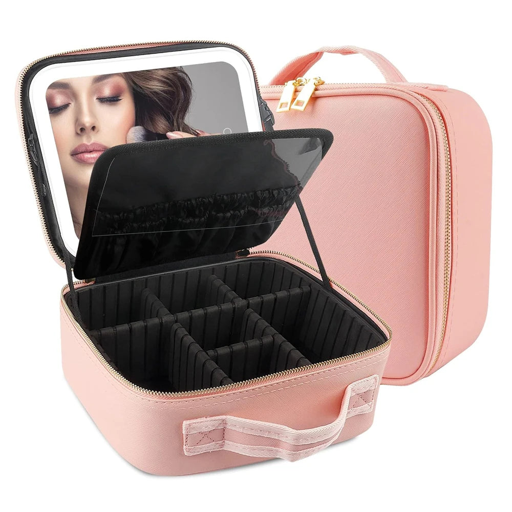 A pink LED lighted makeup train case with adjustable dividers and a clear mirror.