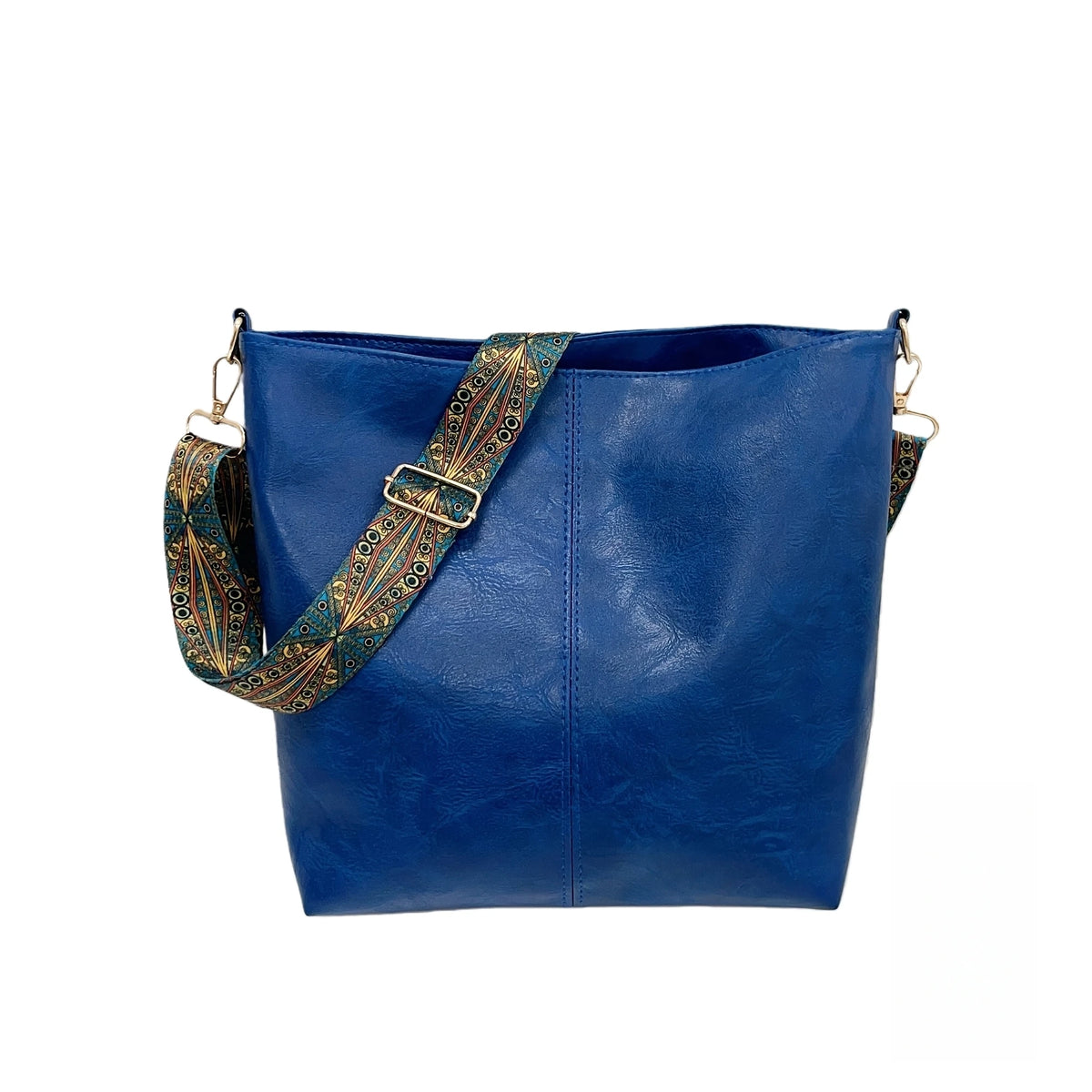 A deep blue leather crossbody hobo bag with a patterned strap.