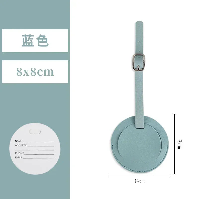 A light blue PU leather luggage tag with a rectangular shape and a silver clip.