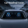 Car headrest cover featuring a pair of gothic skull designs with a blue glow on the interior of a car.