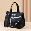 Black insulated lunch bag featuring a happy bear face design.