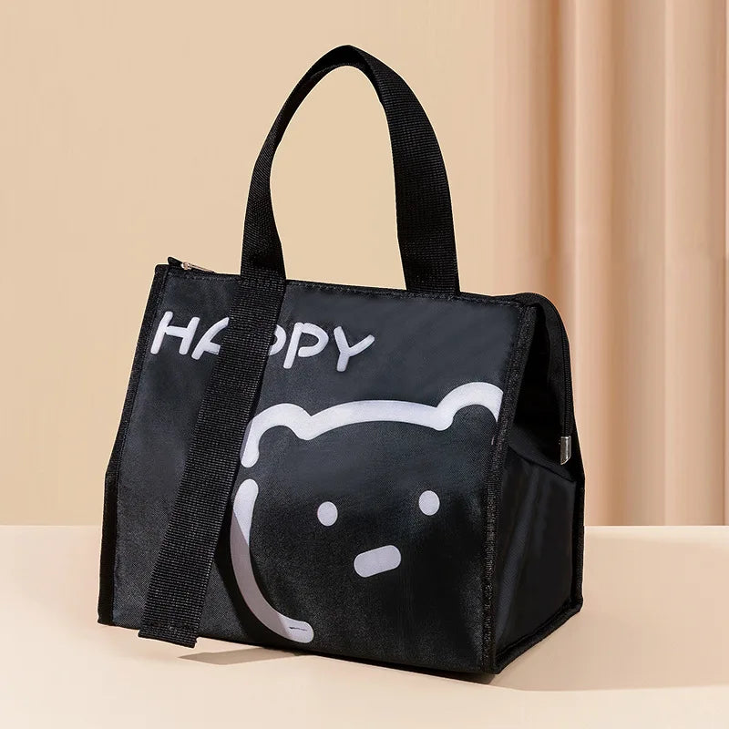 Black insulated lunch bag featuring a happy bear face design.