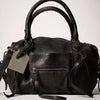 Black vintage PU leather crossbody tote bag with adjustable strap shown from the front.