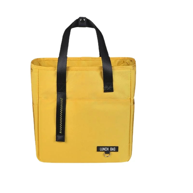 A yellow insulated lunch tote bag with black handles and a waterproof lining.