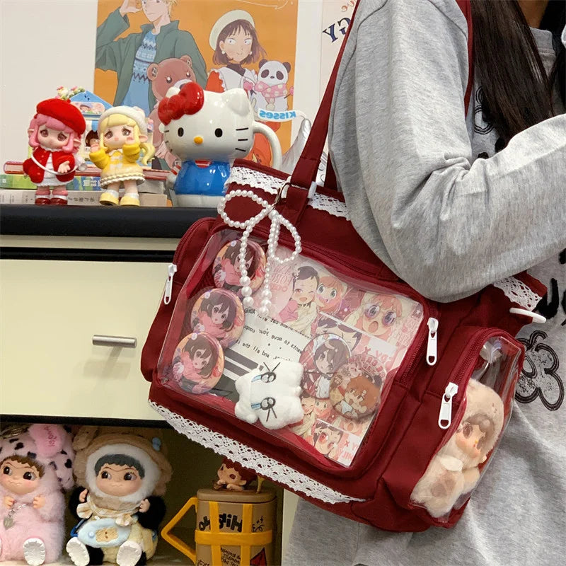 A transparent red shoulder tote bag filled with various small plush toys and accessories.