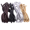 A collection of braided leather cords in dark brown, black, silver, and gold colors for jewelry making.