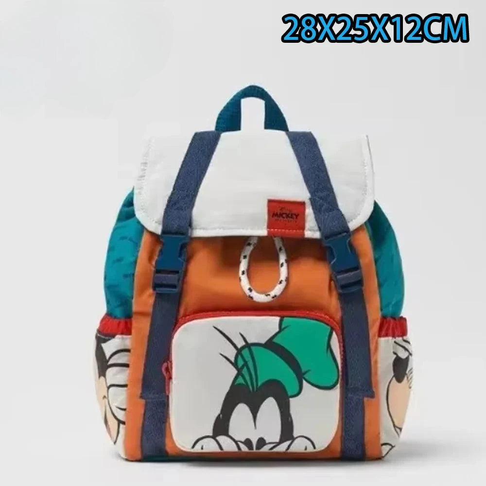 Mochila de pato-ratón de peluche en colores naranja, blanco y turquesa.