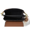 Sac bandoulière noir en faux cuir avec garniture marron et quincaillerie dorée, ouvert.