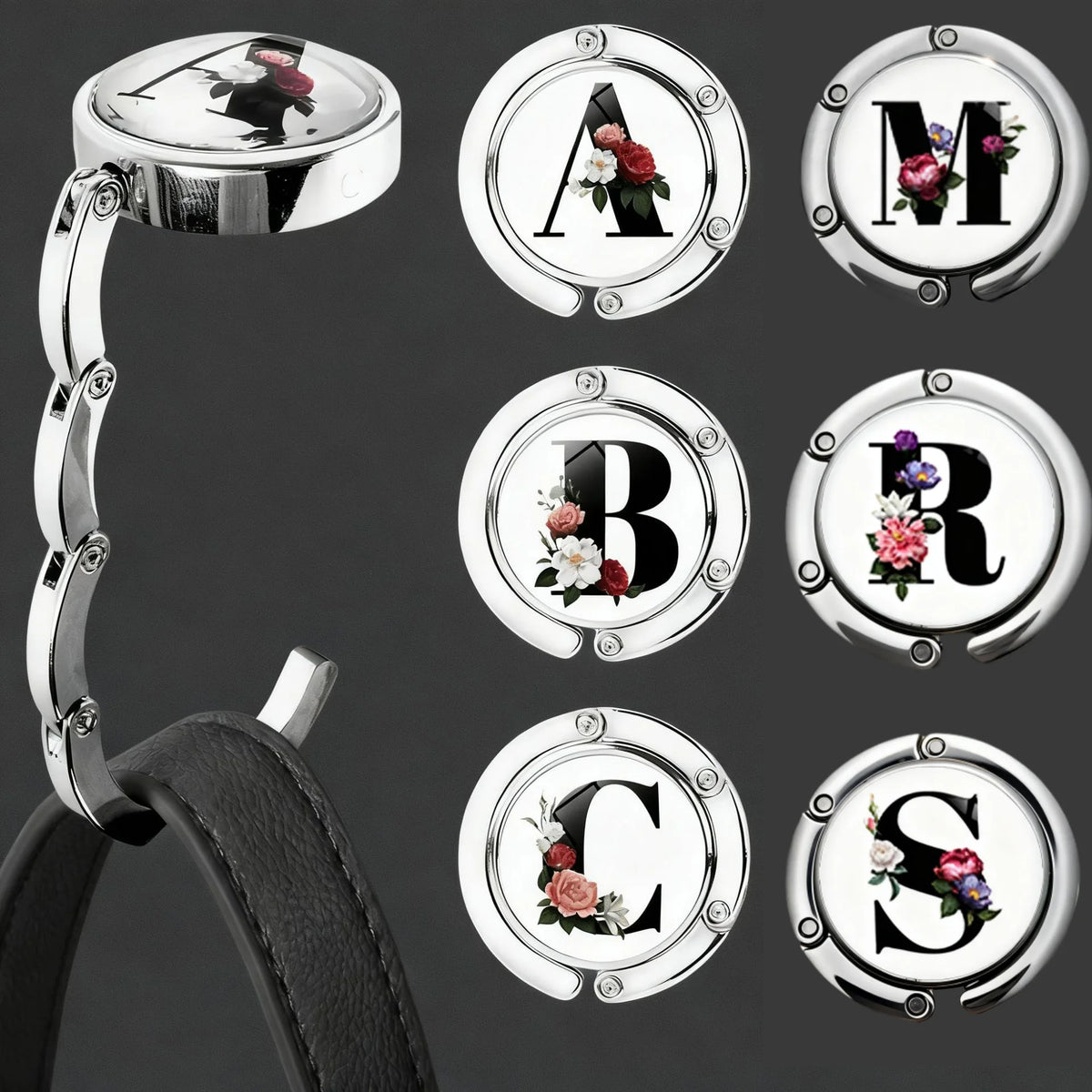Silver foldable letter hanger hook showing the letters A, M, B, R, C, and S.