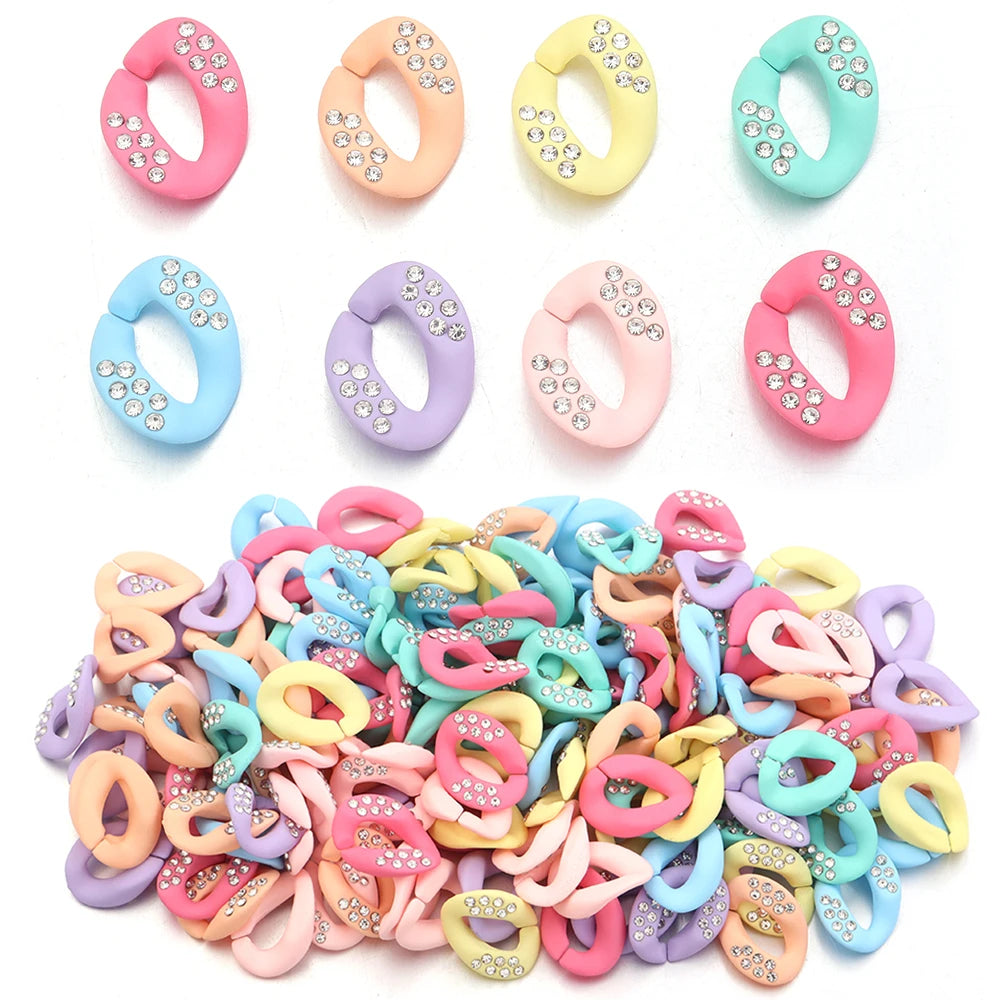 A collection of colorful acrylic link chain connectors in various shades including pink, purple, yellow, and blue.