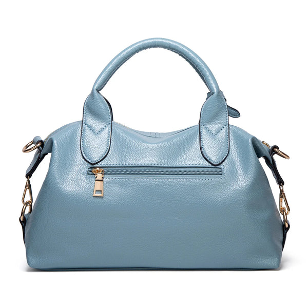 A light blue faux leather Boston handbag with a padded top and gold hardware.