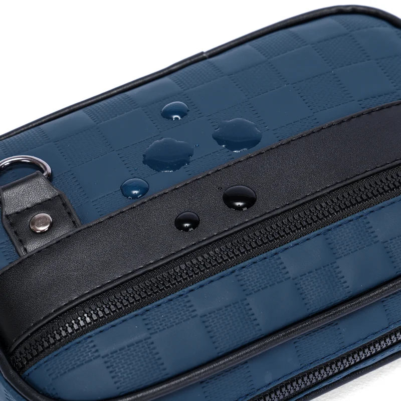 A dark blue men's PU leather crossbody bag with a black adjustable strap and zipper detail.