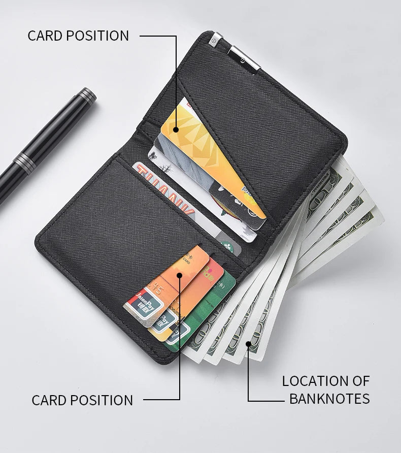A black slim vertical card wallet is shown open, displaying various bank notes and cards.