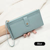 A light blue elegant PU leather coin purse and card holder resting on a white textured fabric.