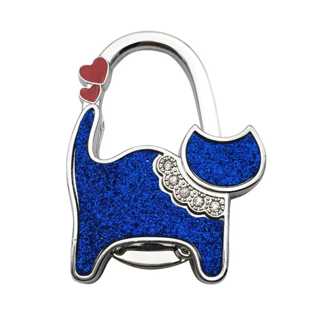 Silver and blue glitter cat-shaped handbag hooks for table hanging