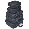 A stack of black portable EVA storage and travel organizer bags.