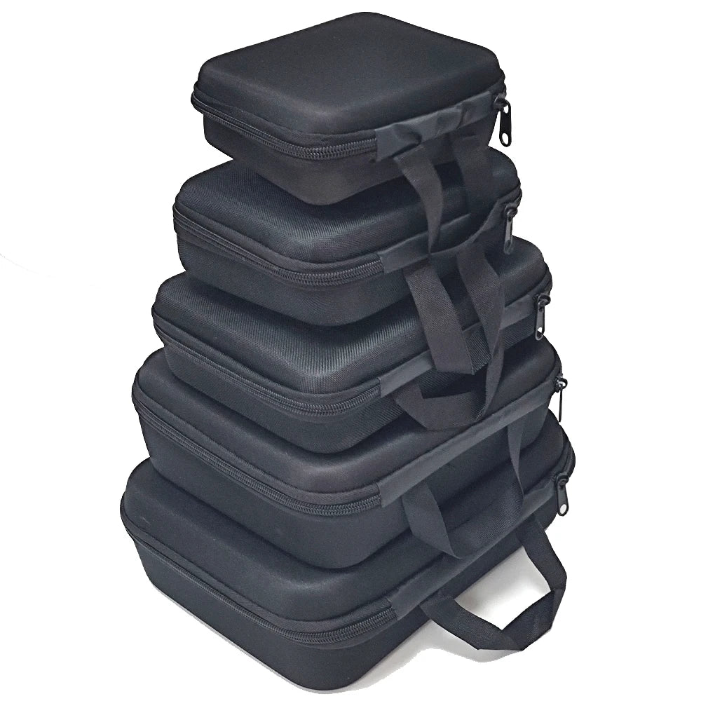 A stack of black portable EVA storage and travel organizer bags.