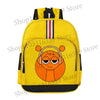A yellow cartoon anime backpack featuring an orange face with large eyes and headphones.