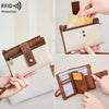 A close-up of a tan leather wallet with multiple slots and RFID protection features is shown being held by a hand.