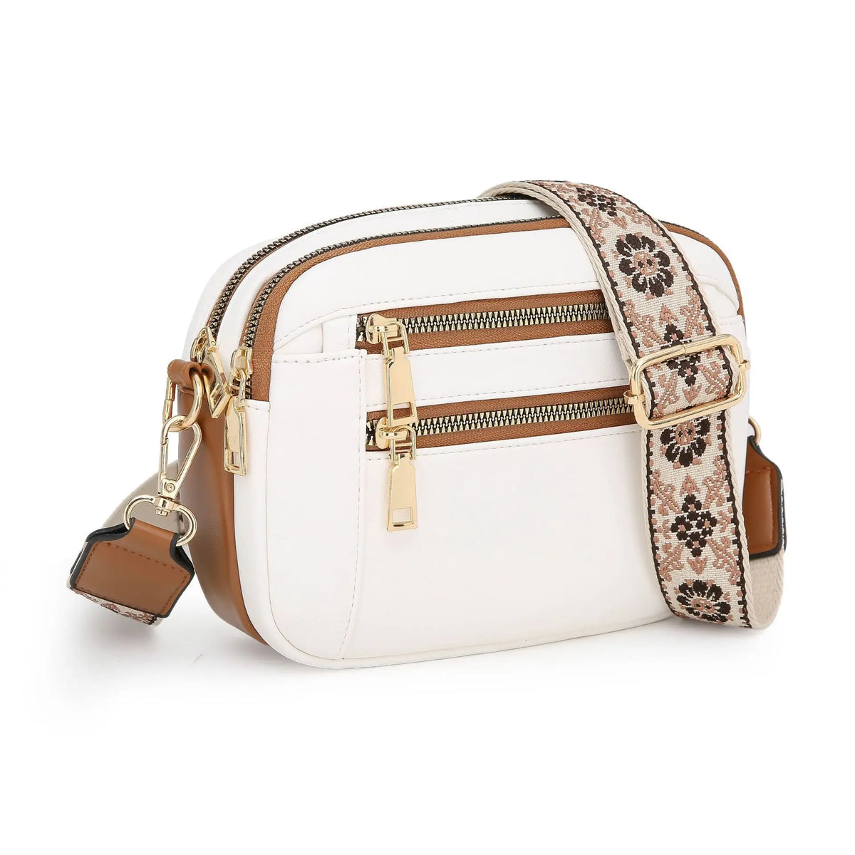 A white PU leather crossbody bag with gold hardware and brown patterned fabric accents.