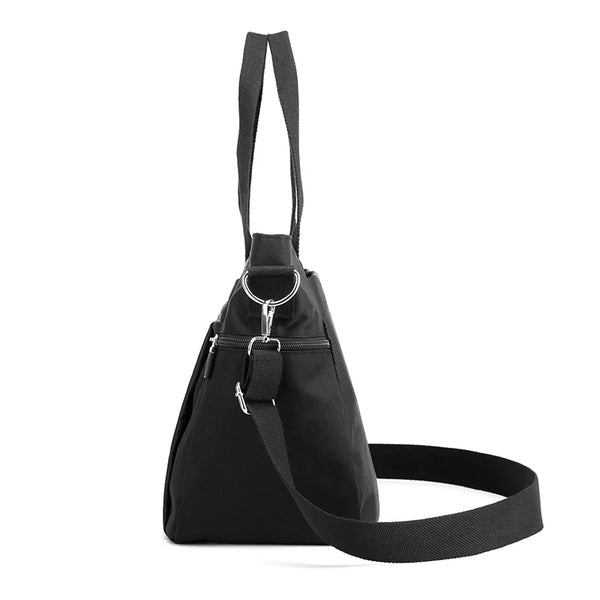 A black durable nylon tote bag with a secure zipper closure and shoulder strap.