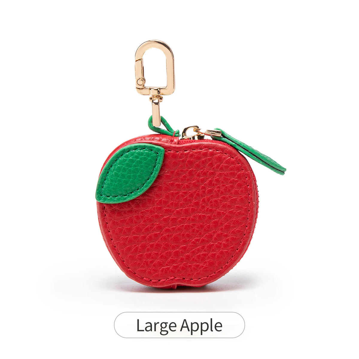 Red apple coin purse keychain with a green leaf detail and gold-colored hardware