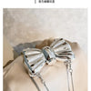 Silver elegant bowknot bag with a metallic finish and detachable chain strap