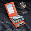 An orange RFID protection wallet showing card slots, an ID window, and a money clip on a dark fabric background.