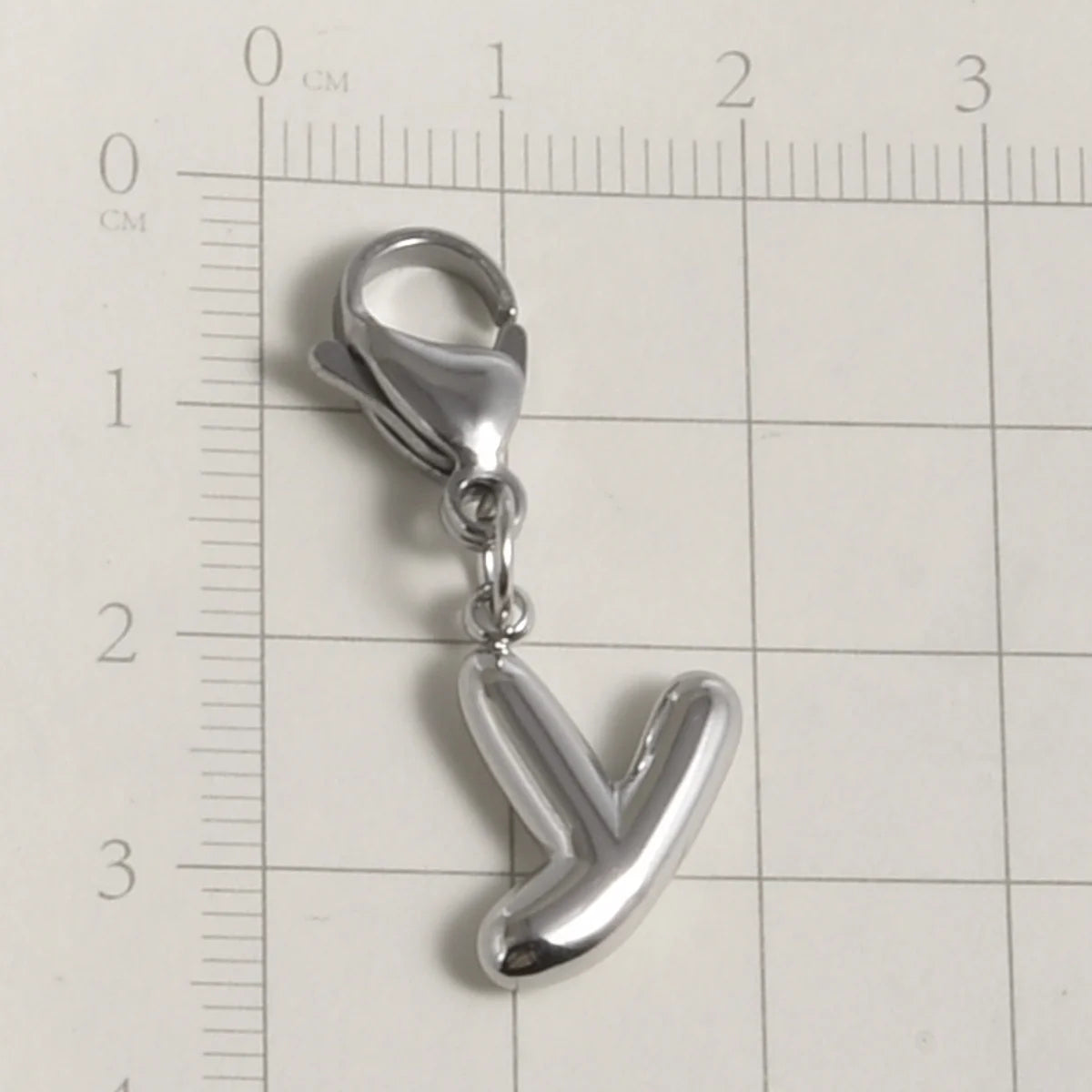Silver stainless steel alphabet letter charm shaped like the letter Y with a lobster clasp