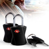 Black keyed luggage lock with red diamond emblem and a key.