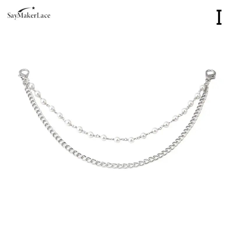 A multi-layer metal chain strap shoulder bag charm with delicate silver links.