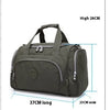 A dark olive green nylon travel duffle bag with adjustable straps, measuring 37cm long and 23cm wide.