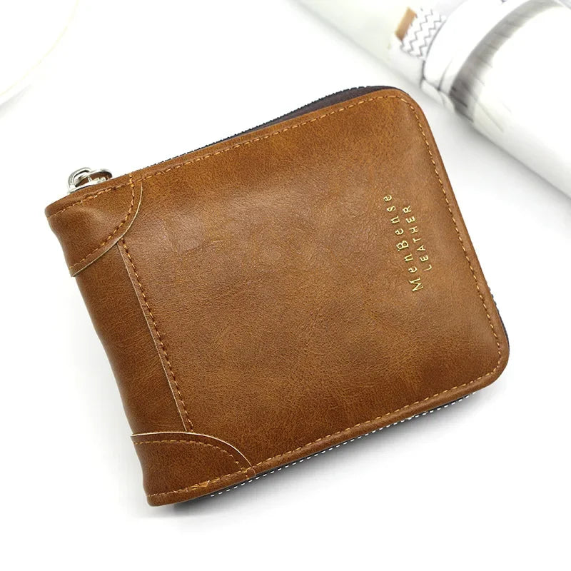 A brown men's vintage PU leather zipper card wallet lying on a white surface.