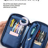 A navy blue multi-compartment pencil case is shown open, demonstrating the quick access tray feature.