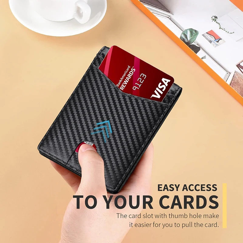 A hand holds a black leather wallet with a thumb hole, displaying a red credit card.