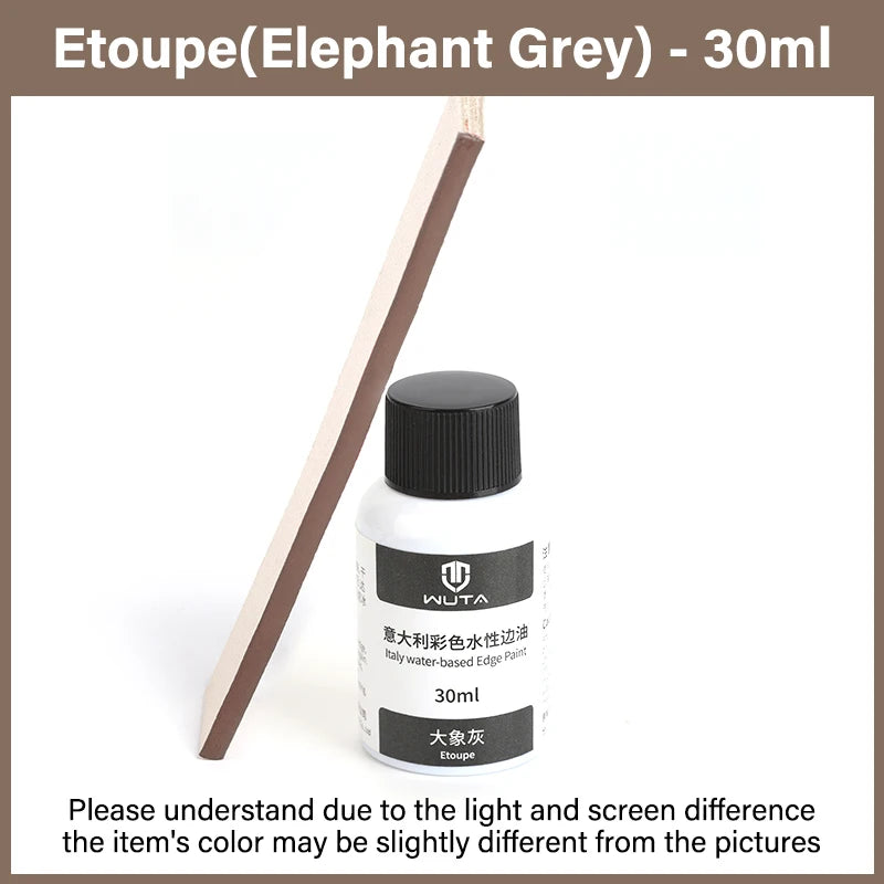 Bouteille de peinture au huile avec bordure en cuir gris éléphant Wuta, 30ml, à côté d'un bâton en bois.