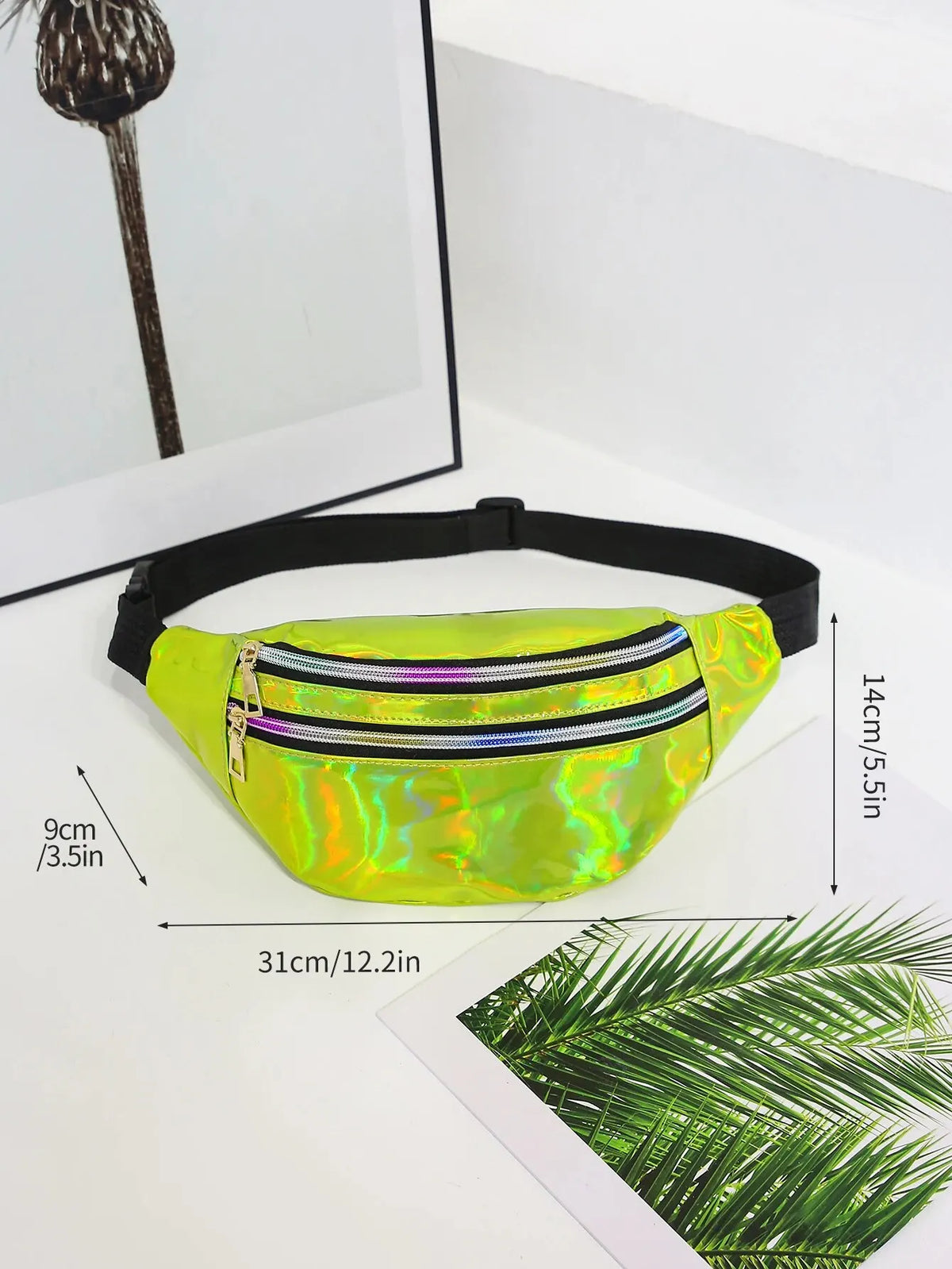 A bright lime green holographic sequin waist bag with a black adjustable strap displayed on a white surface.