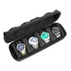A black leather watch organizer travel case holding several wristwatches.