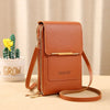 A brown leather crossbody shoulder bag with a gold zipper and strap resting on a light surface.