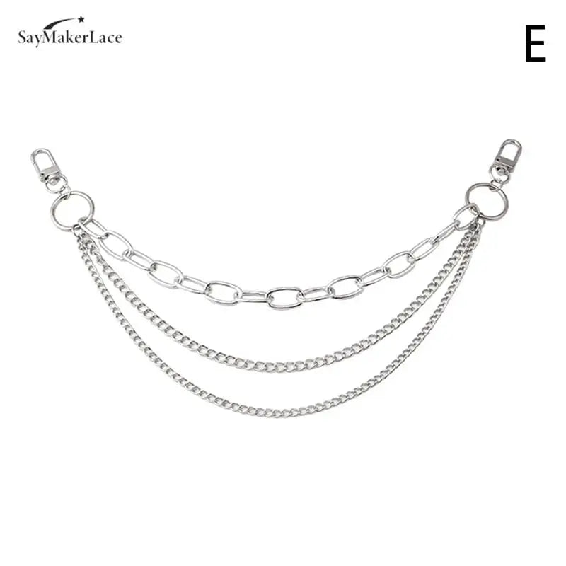 A multi-layer metal chain strap charm for a shoulder bag.