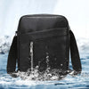 A black waterproof PU leather sling bag is shown being splashed by water.