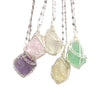 Handcrafted amethyst crystal pendant necklace featuring a copper wire wrap and multiple dangling crystals.