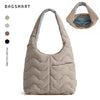 A beige quilted nylon shoulder bag with a light blue lining and a matching fabric pouch shown next to it.